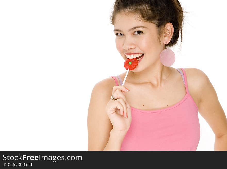 A cute young asian woman with a lollipop. A cute young asian woman with a lollipop