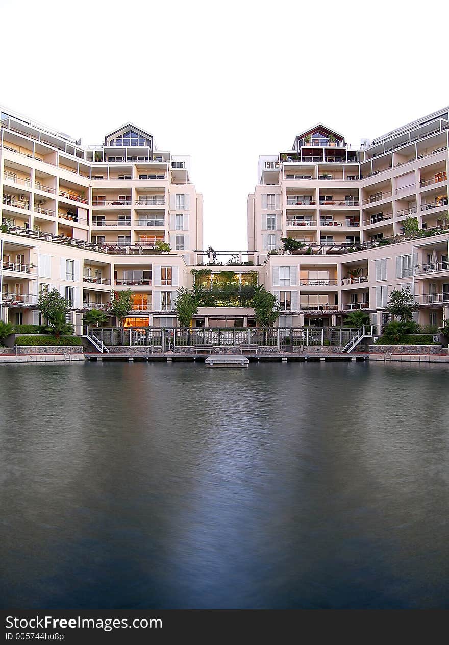 Portrait photo of luxury residential units from canal. Portrait photo of luxury residential units from canal.