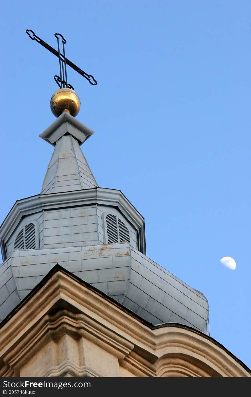 Cross and early evening moon. Cross and early evening moon