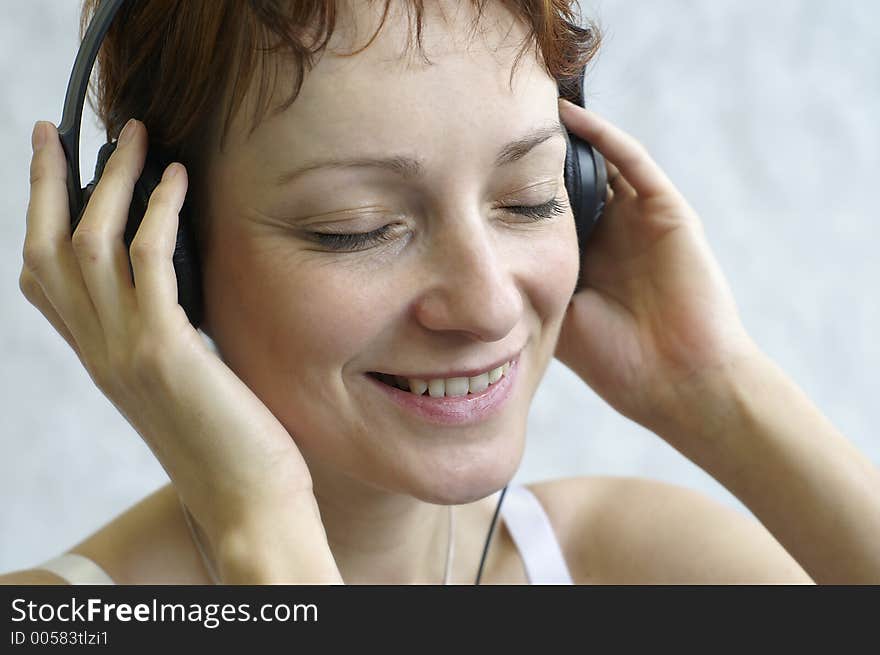 A woman with headphones