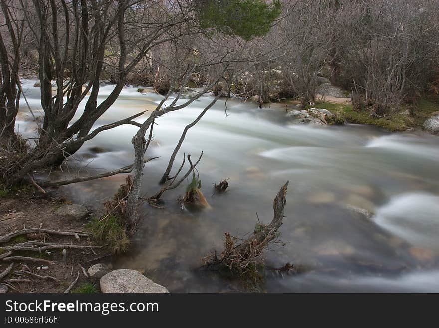 Artistic long exposure of a water in a river. Artistic long exposure of a water in a river