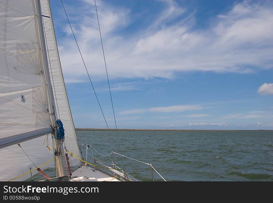 Sailboat cruissing in the mediterranean coast