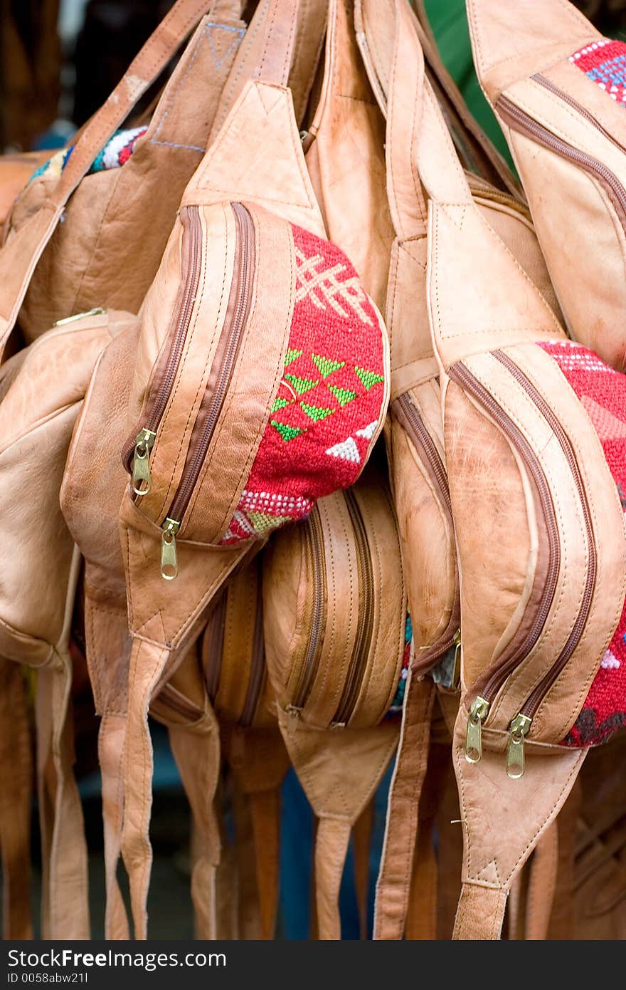 Lots of fanny packs in a street market. Lots of fanny packs in a street market