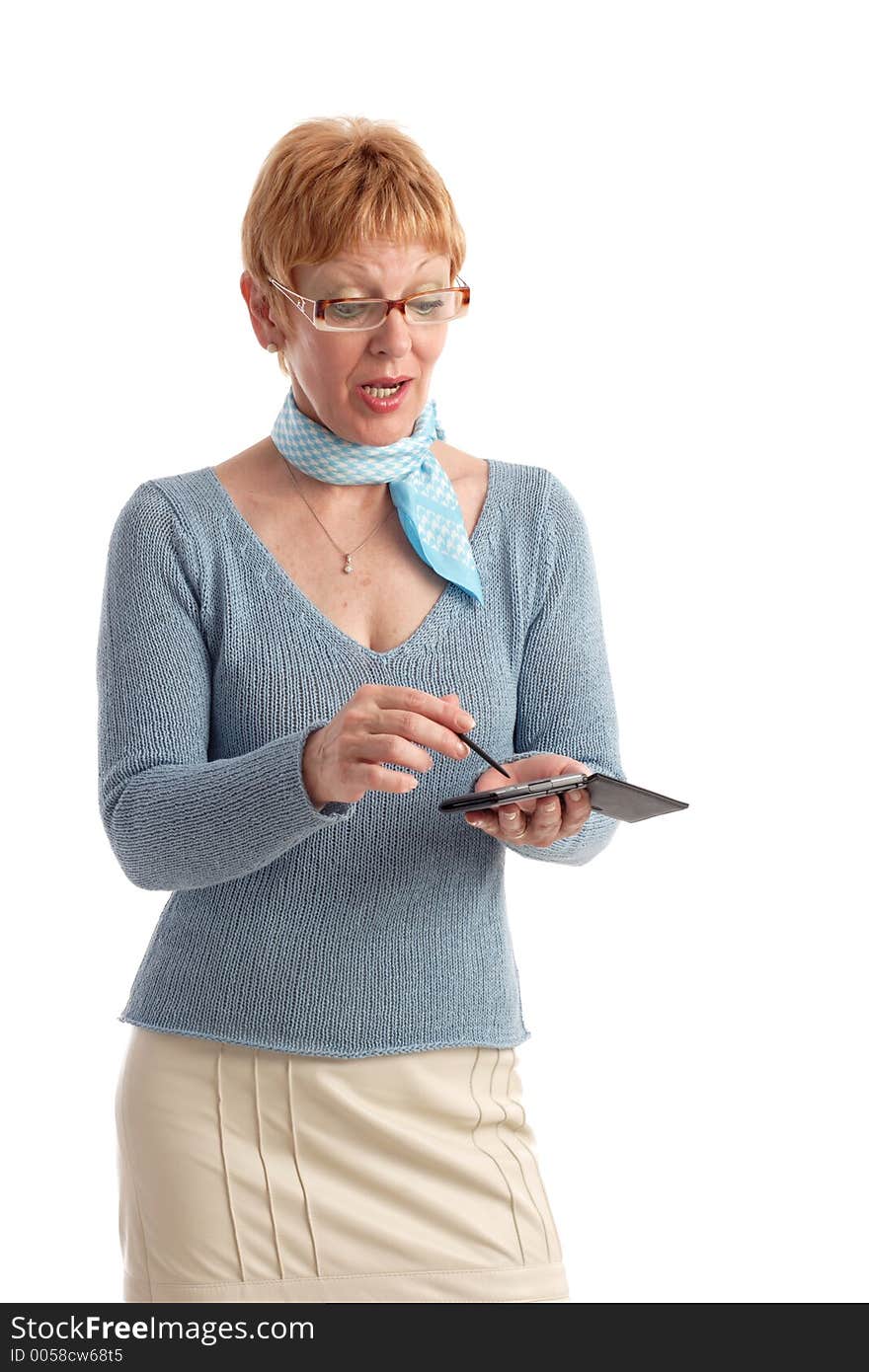 Attractive mature woman using handheld