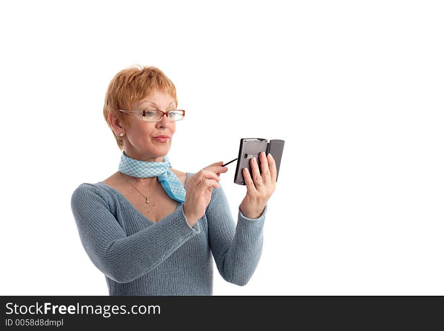 Attractive mature woman using handheld