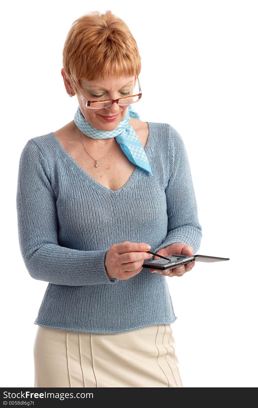 Attractive mature woman using handheld