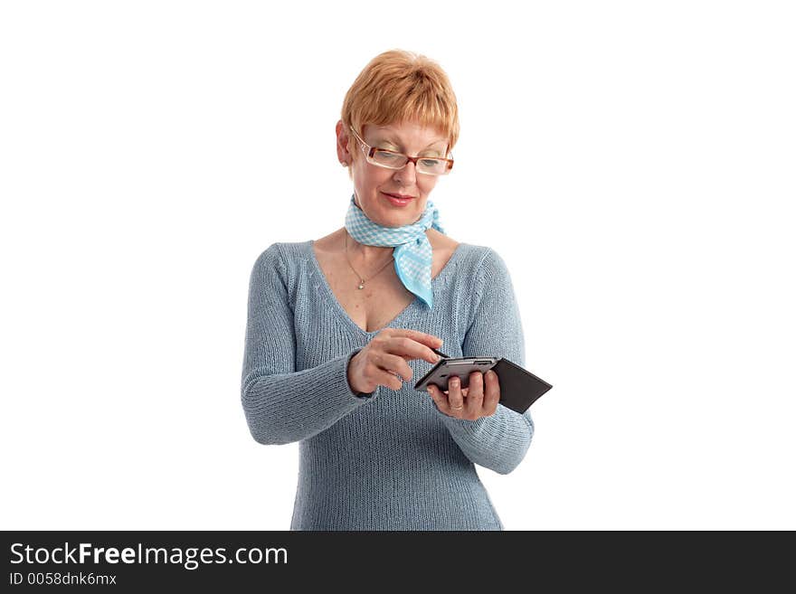 Attractive mature woman using handheld