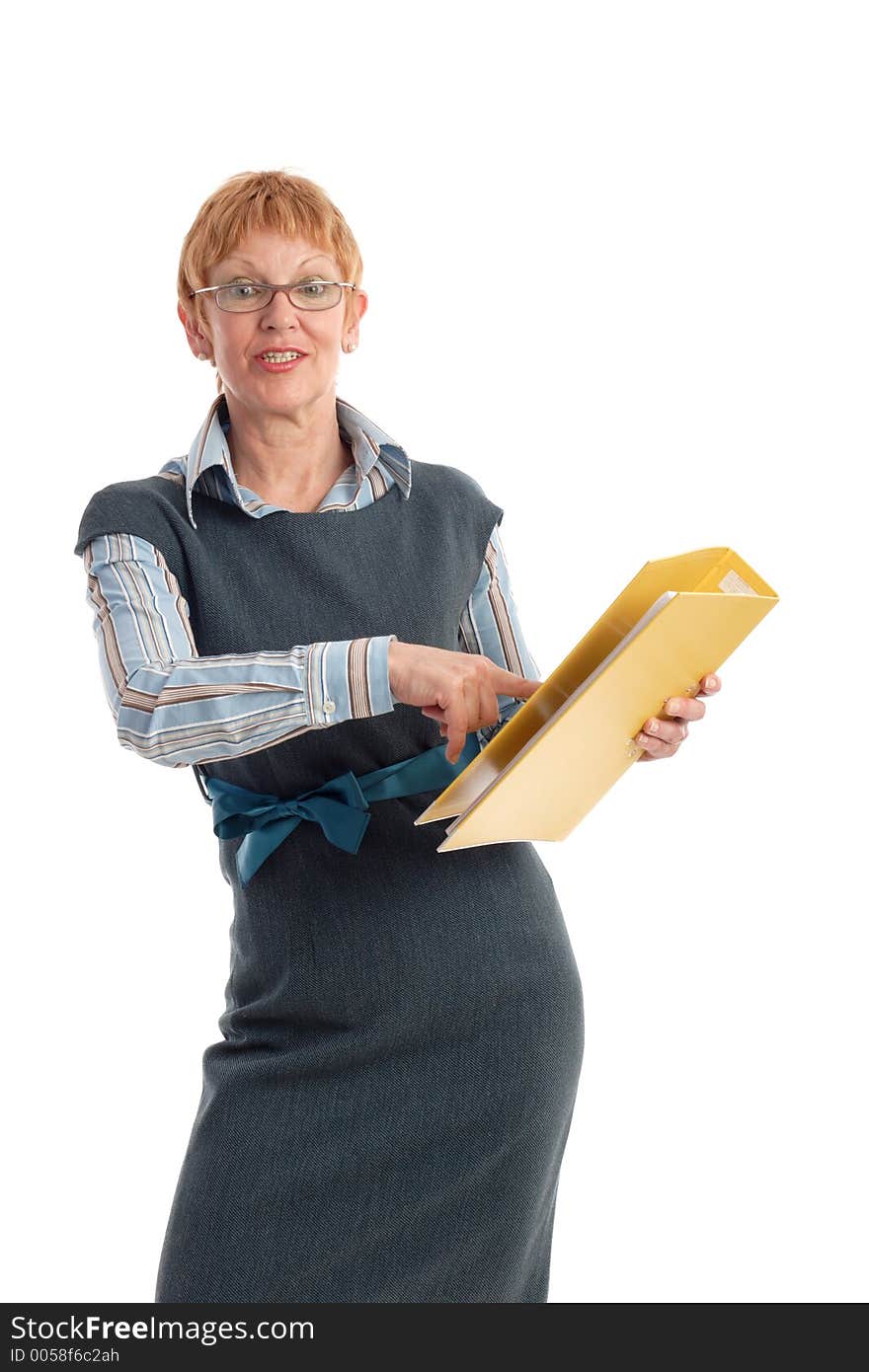 Portrait of a beautiful mature business woman holding yellow binder. Portrait of a beautiful mature business woman holding yellow binder