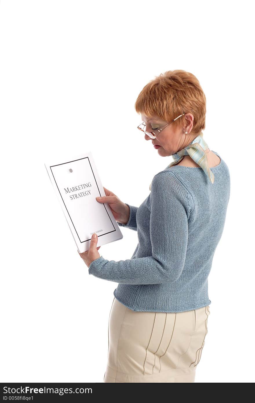 Portrait of a beautiful mature business woman holding documents. Portrait of a beautiful mature business woman holding documents