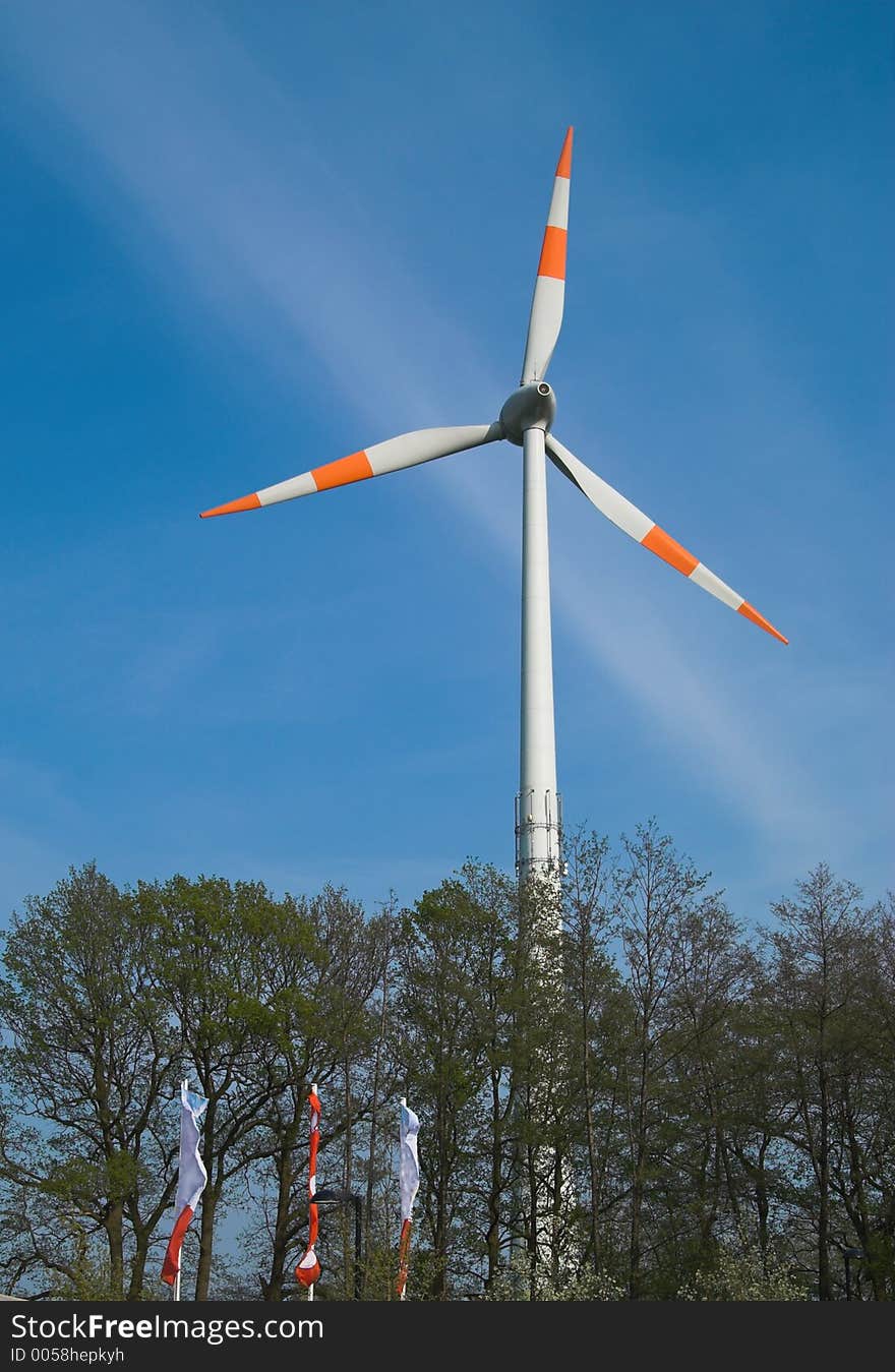 Wind Turbine Against Blue Sky