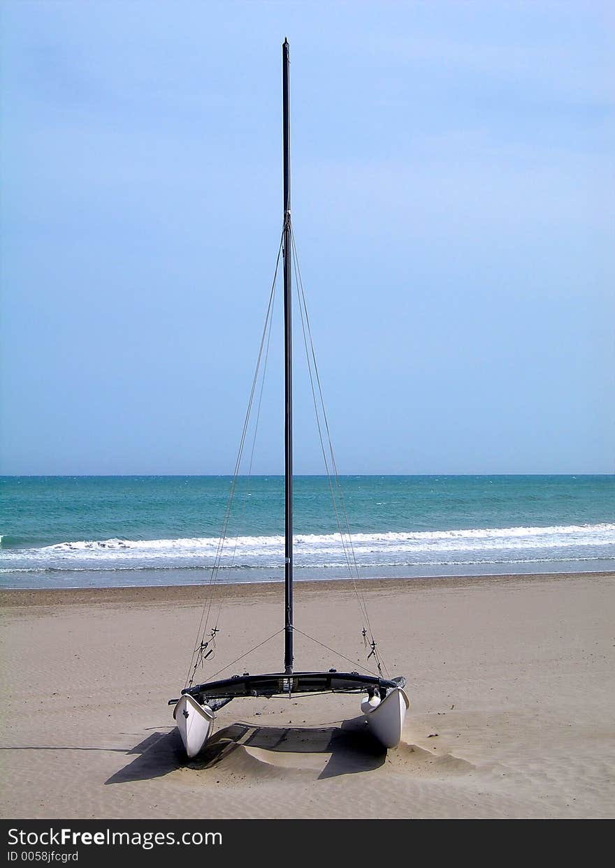 Catamaran in the sand of a beach