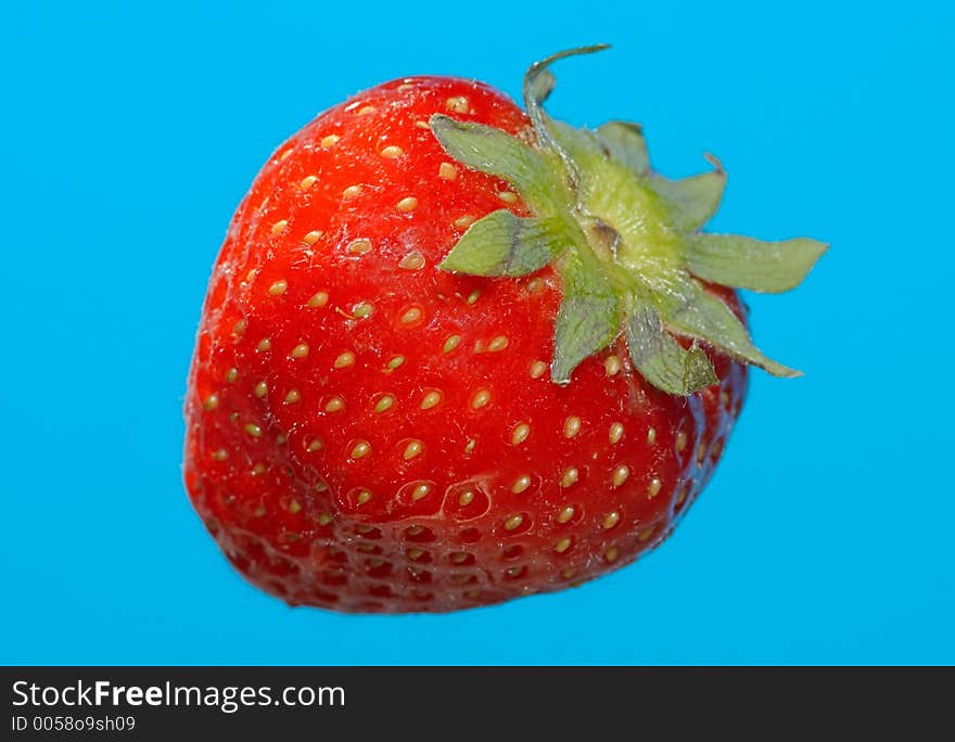 Strawberry on a blue background. Strawberry on a blue background