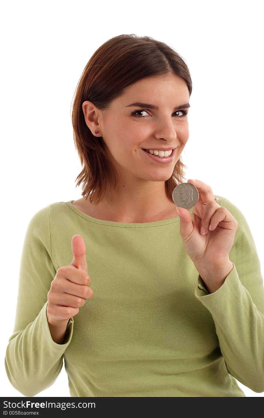 Portrait of a young woman holding silver dollar and thumb up