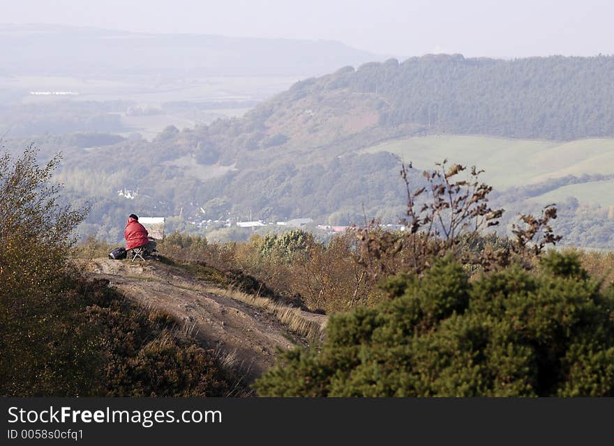 An artist enjoying solitude and tranquility. An artist enjoying solitude and tranquility