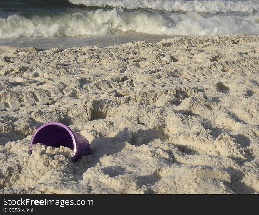 This photo shows an abandon bucket in the sand. This photo shows an abandon bucket in the sand.