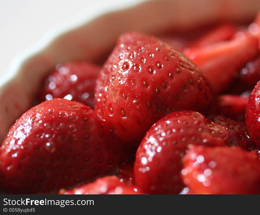 Strawberries after a brief simmer with a few soupfuls of sugar. Strawberries after a brief simmer with a few soupfuls of sugar