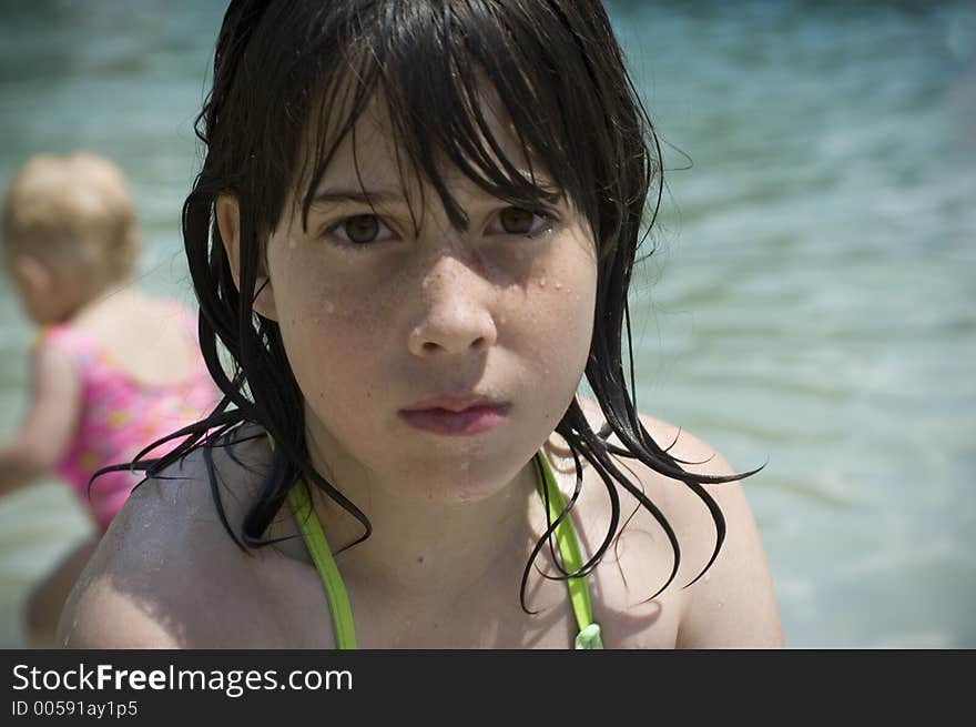 A girl puts on a pouty face at the spring. A girl puts on a pouty face at the spring.