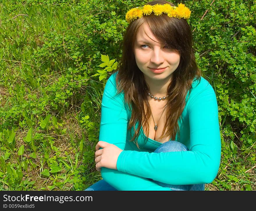 Portrait of the girl in a wreath