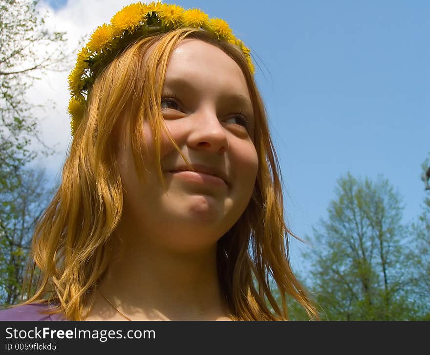 Portrait of the girl in a wreath