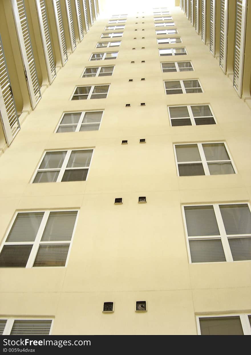 This photo shows a building in a vertical perspective. This photo shows a building in a vertical perspective.