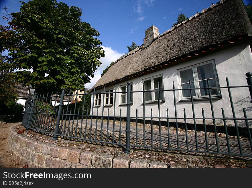 Thached roof traditional house in denmark a sunny summer day