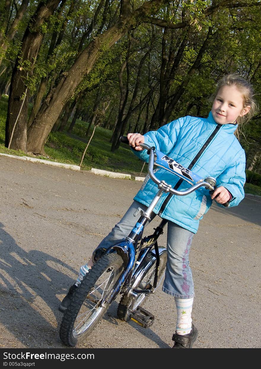 little girl on bicycle. little girl on bicycle