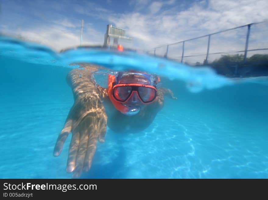 Young boy in pool. Young boy in pool