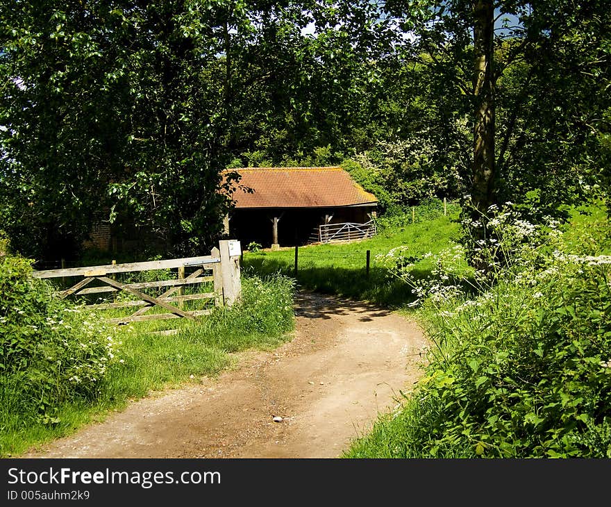 Path leading to a barn