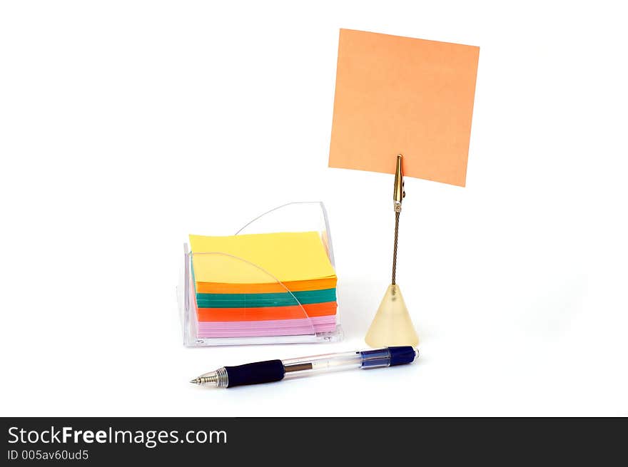 Blank note on stand with stack of notes in holder and pen -look in profile for more