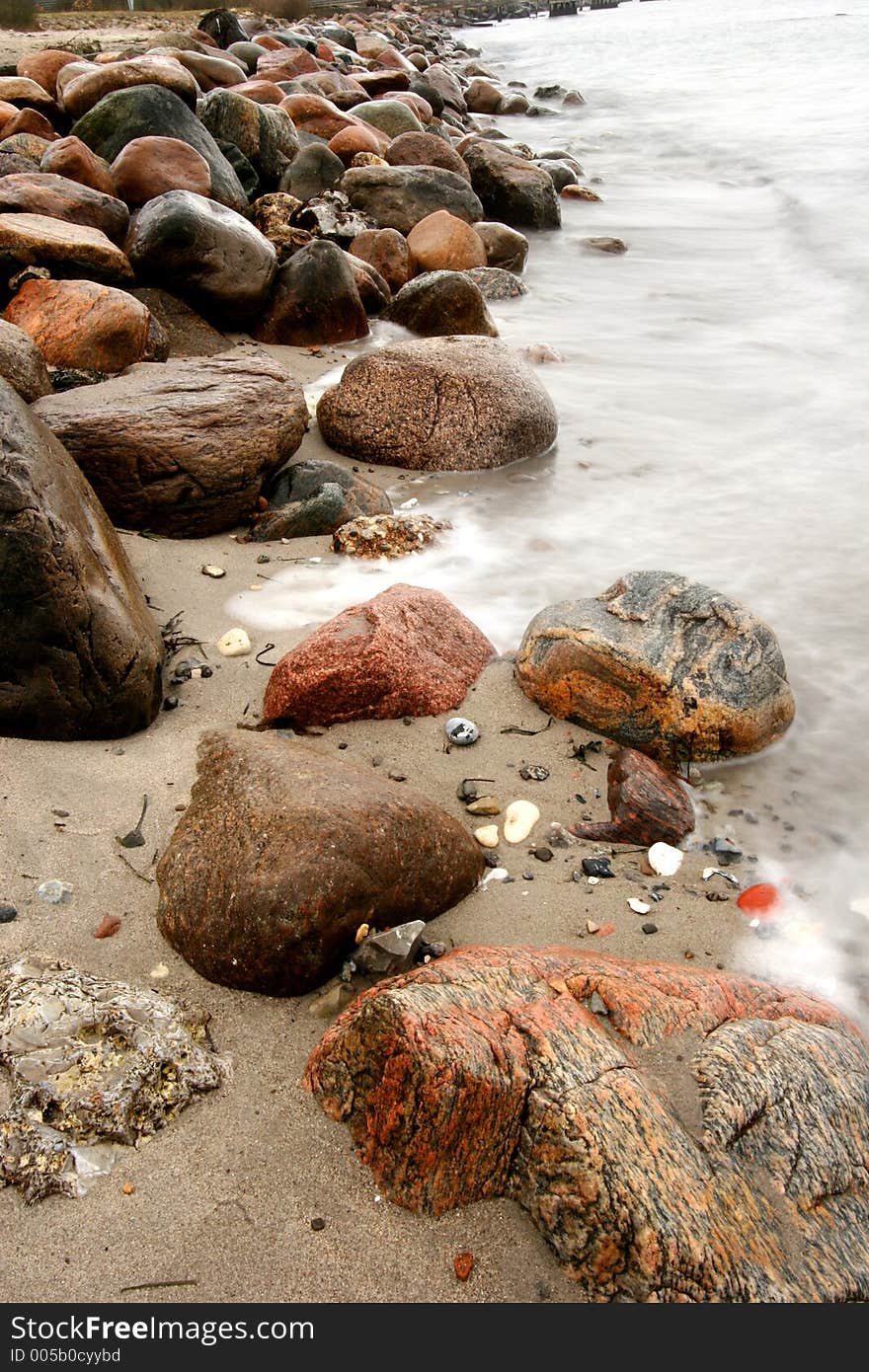 Water splashing on rocks in denmark. Water splashing on rocks in denmark