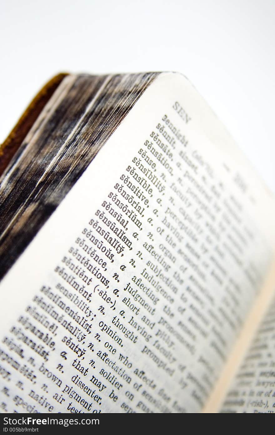 Old Dictionary, pages with words, short DOF shot in RAW with 4x Closeup Filter, this thing is only like 2 tall, used to be my mum's and it later had a distressing time while I burned it with a magnifying glass as a kid :D. Old Dictionary, pages with words, short DOF shot in RAW with 4x Closeup Filter, this thing is only like 2 tall, used to be my mum's and it later had a distressing time while I burned it with a magnifying glass as a kid :D