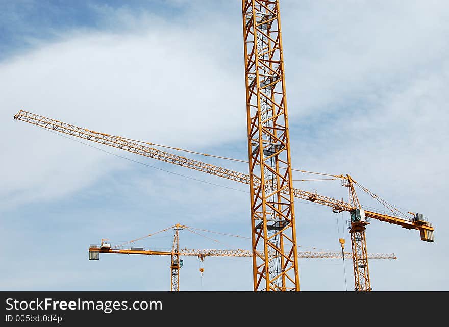 Three cranes in Montreal, Canada. Three cranes in Montreal, Canada.