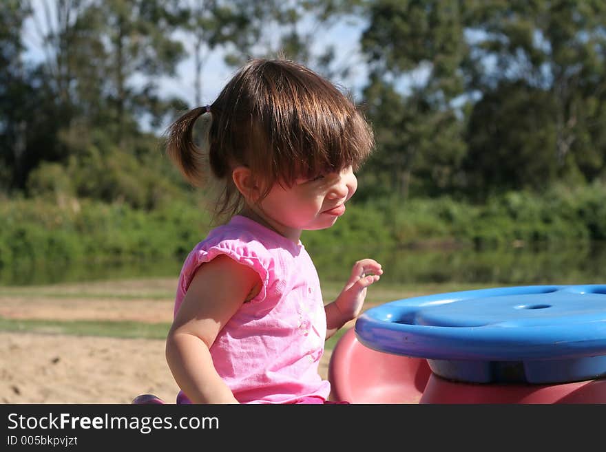 Small child playing in the park. Small child playing in the park