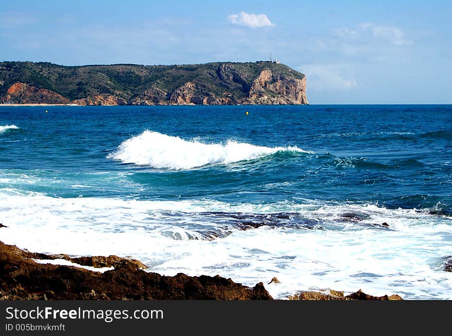 Tosca beach with waves and white caps. Tosca beach with waves and white caps