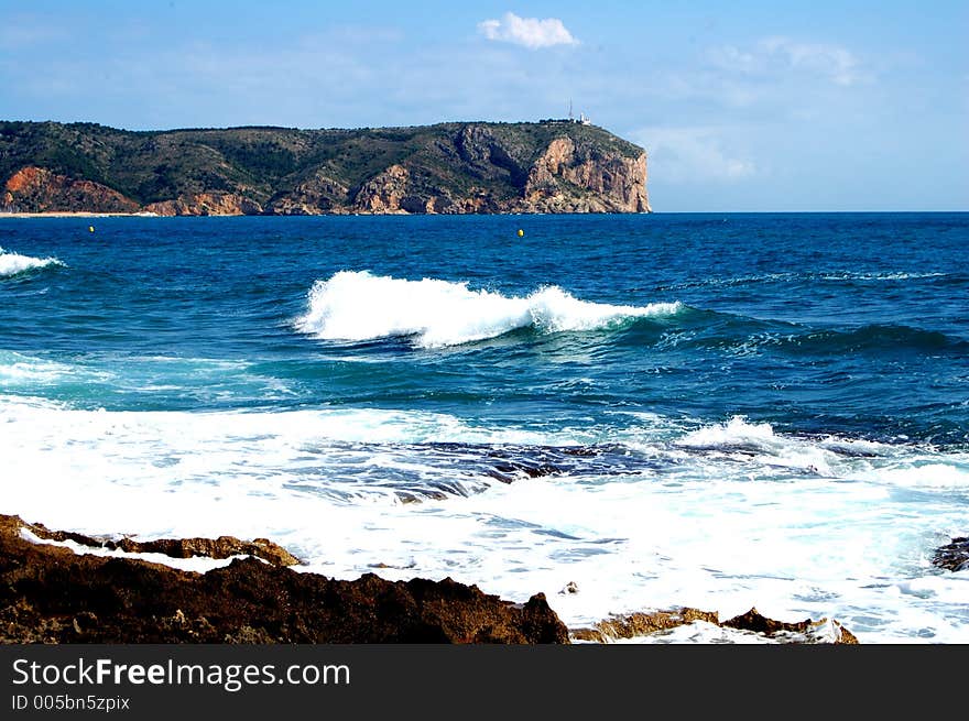 Tosca beach with waves and white caps. Tosca beach with waves and white caps