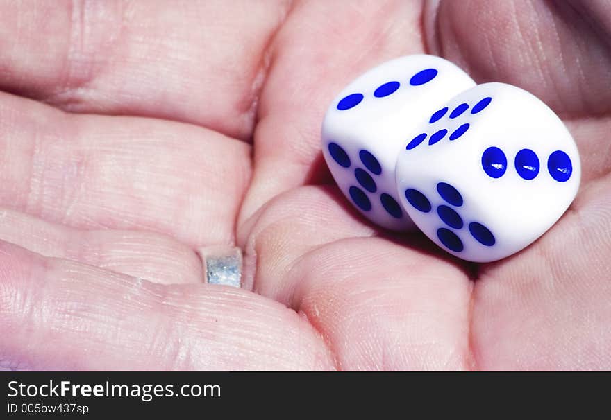 Dice in womans hands. Dice in womans hands.