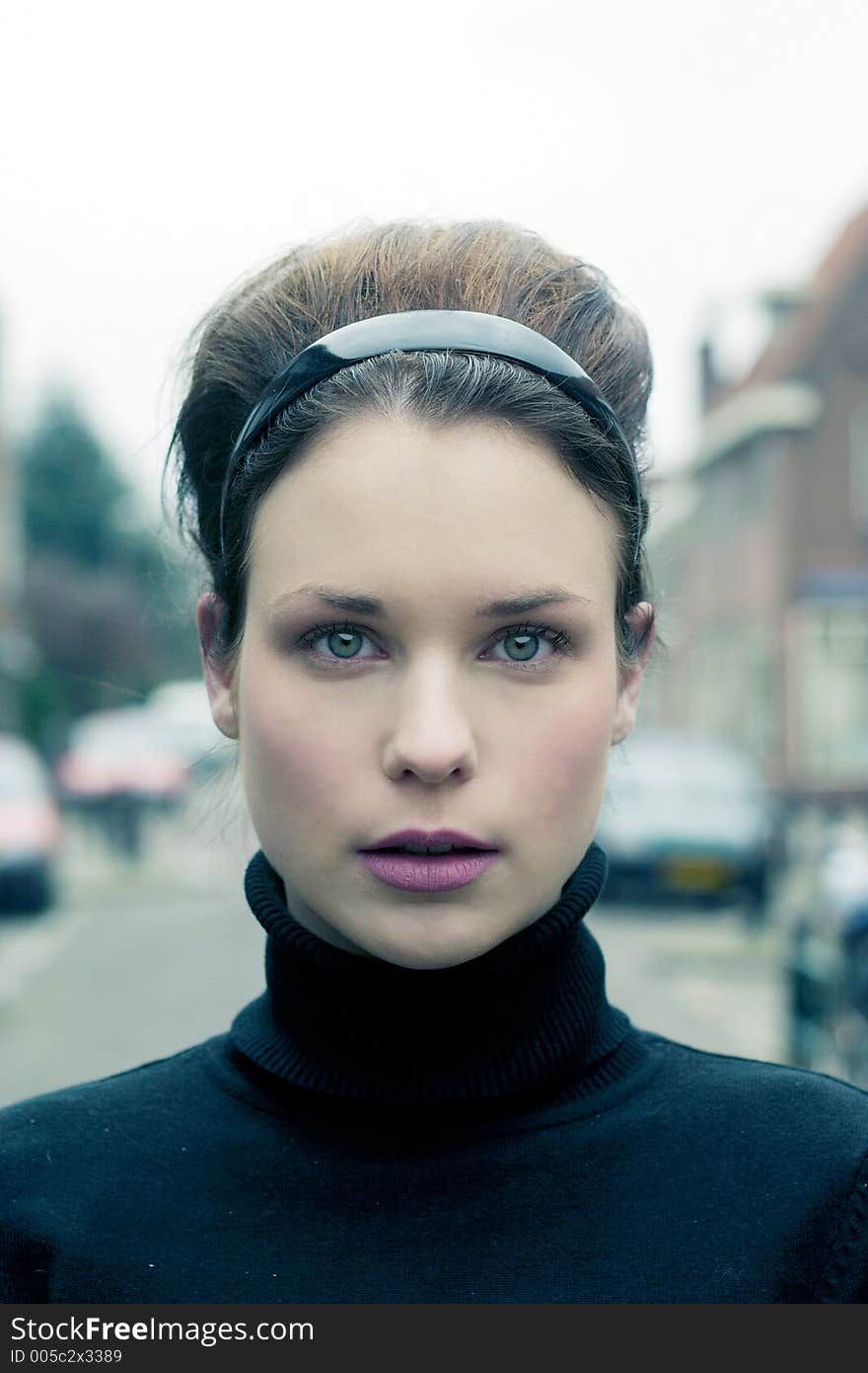 Close Up of a beautiful woman in vintage make up and hairstyle. Close Up of a beautiful woman in vintage make up and hairstyle