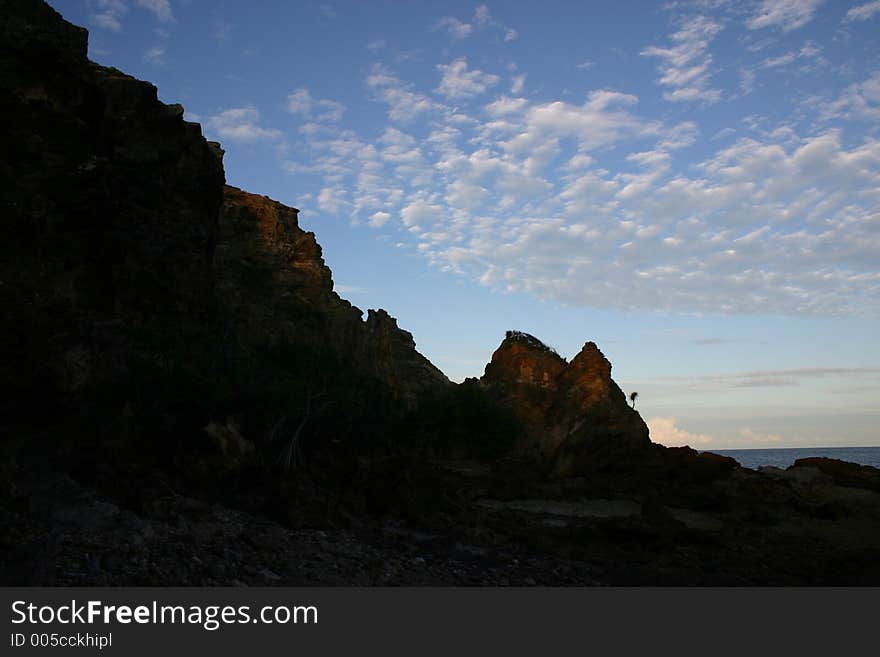 Rugged coastline silhouette