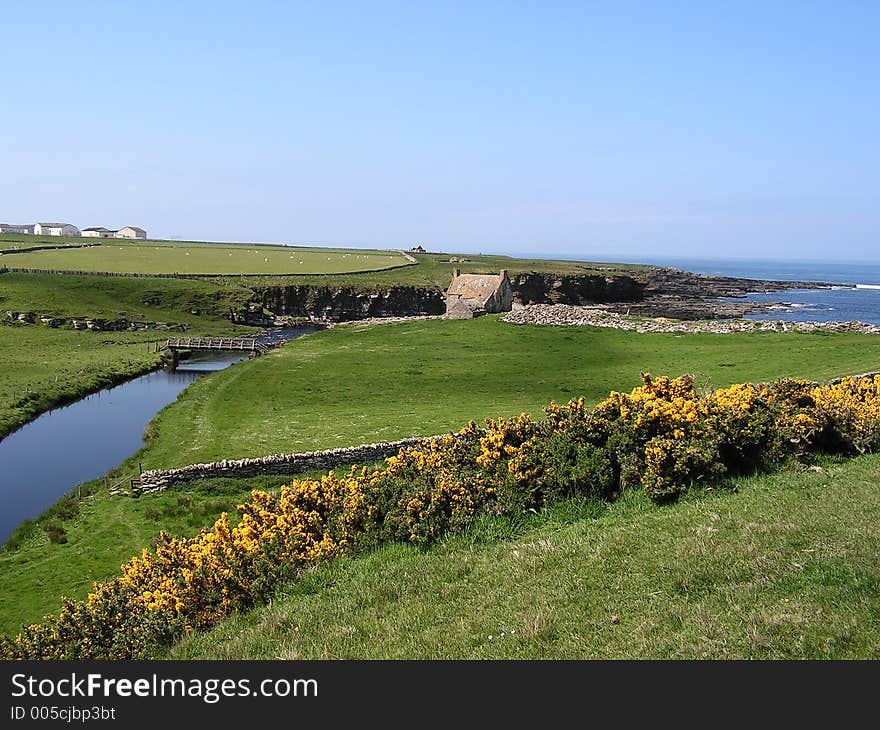 A view of Crosskirk Bay, Caithness, Scotland. Home of St. Mays Chapel built 12th century. A view of Crosskirk Bay, Caithness, Scotland. Home of St. Mays Chapel built 12th century.