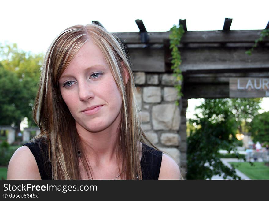 Woman posing in a garden. Woman posing in a garden