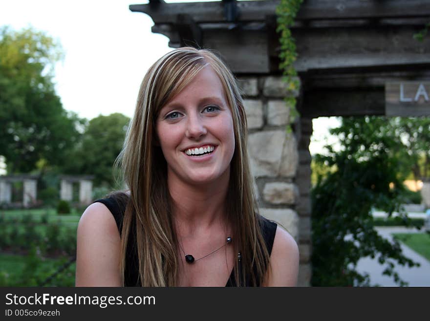 Woman posing in a garden. Woman posing in a garden