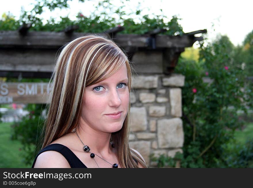 Woman posing in a garden. Woman posing in a garden