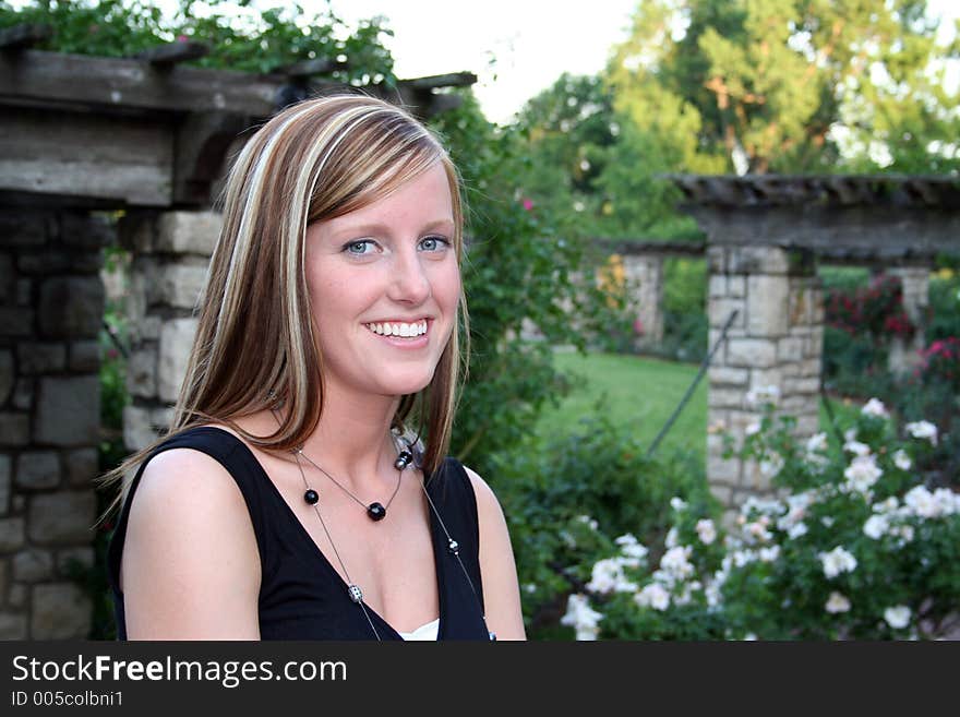 Woman posing in a garden. Woman posing in a garden