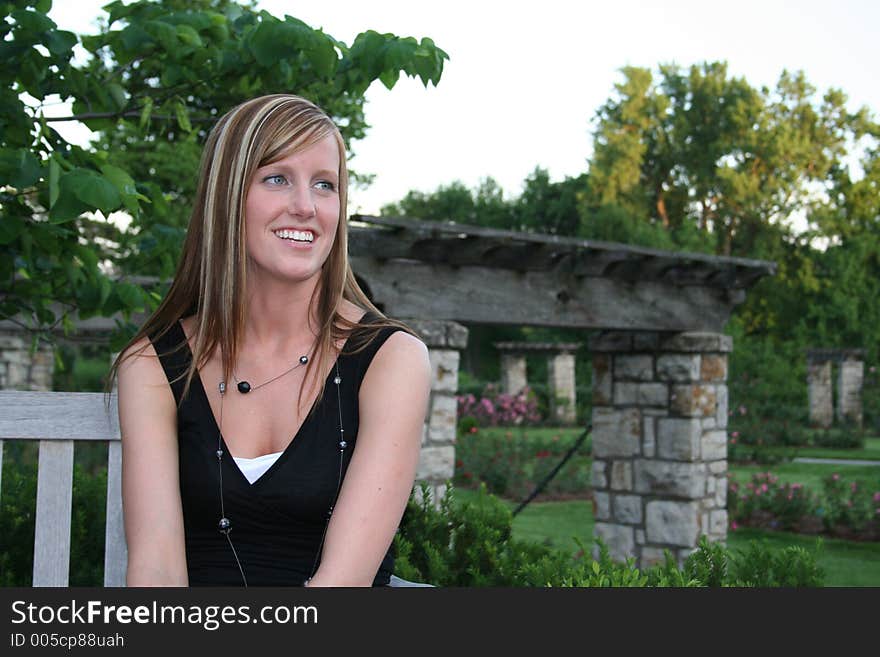 Woman posing in a garden. Woman posing in a garden