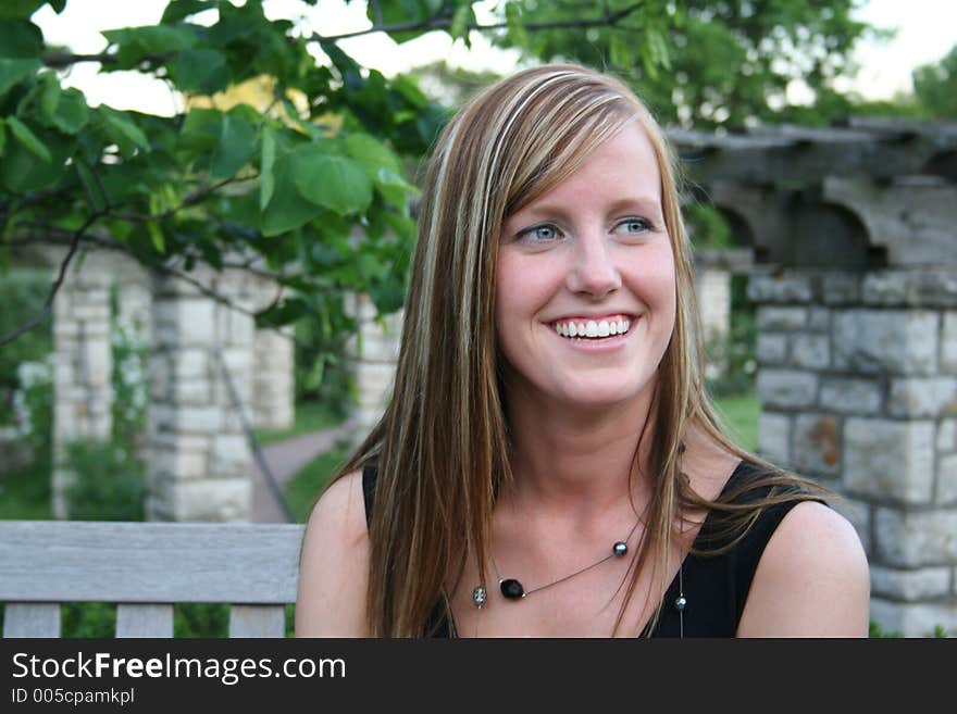 Woman posing in a garden. Woman posing in a garden