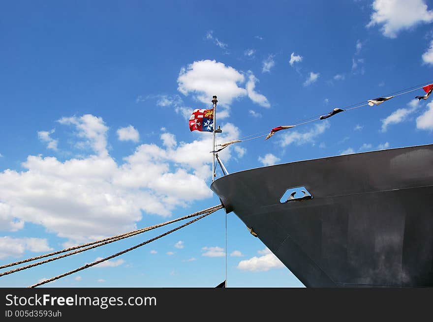 The stem of an italian battle ship against a blue sky. The stem of an italian battle ship against a blue sky.