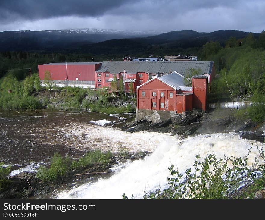 Old power station and waterfall