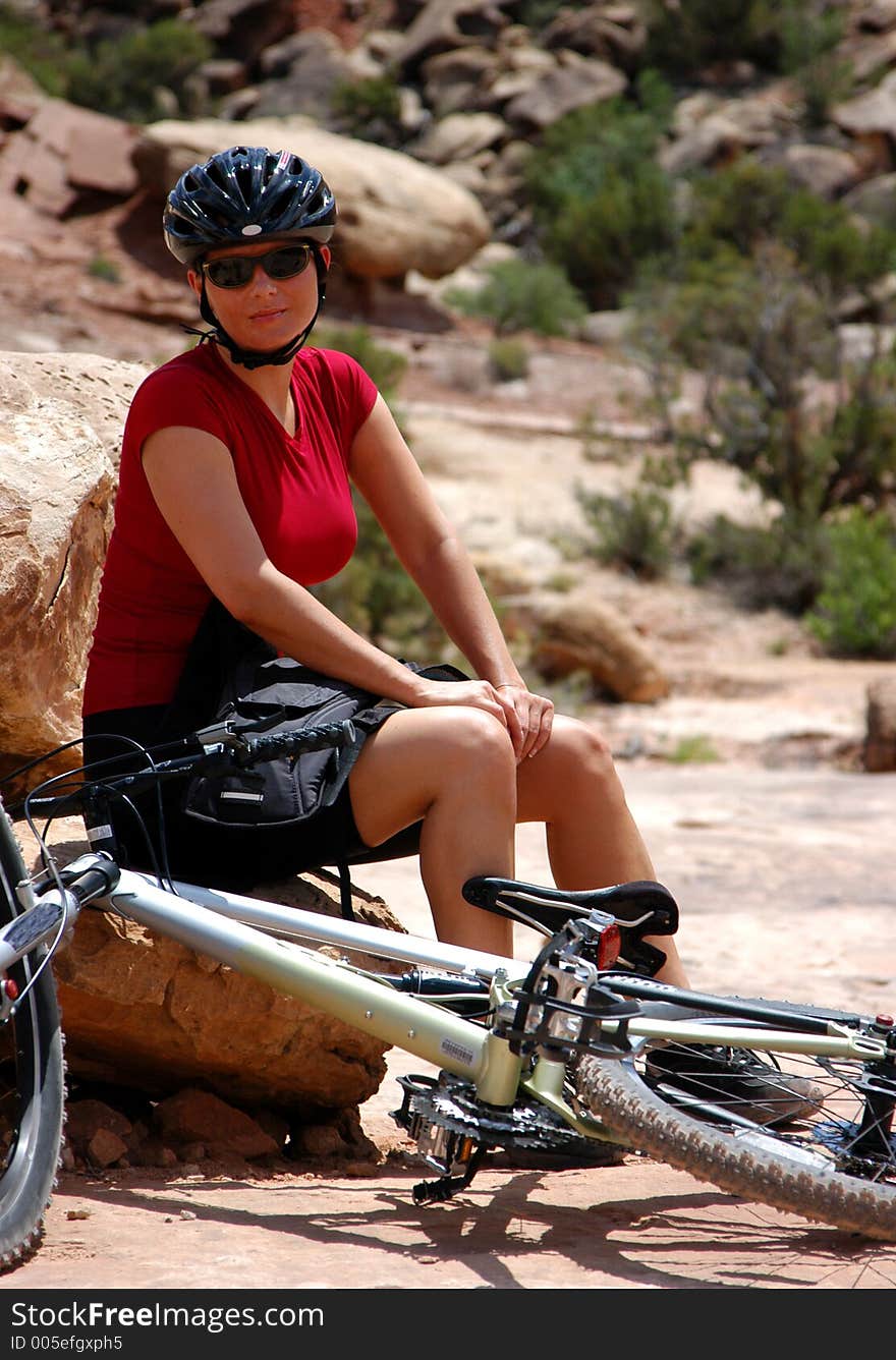 Female mountain biker taking a rest