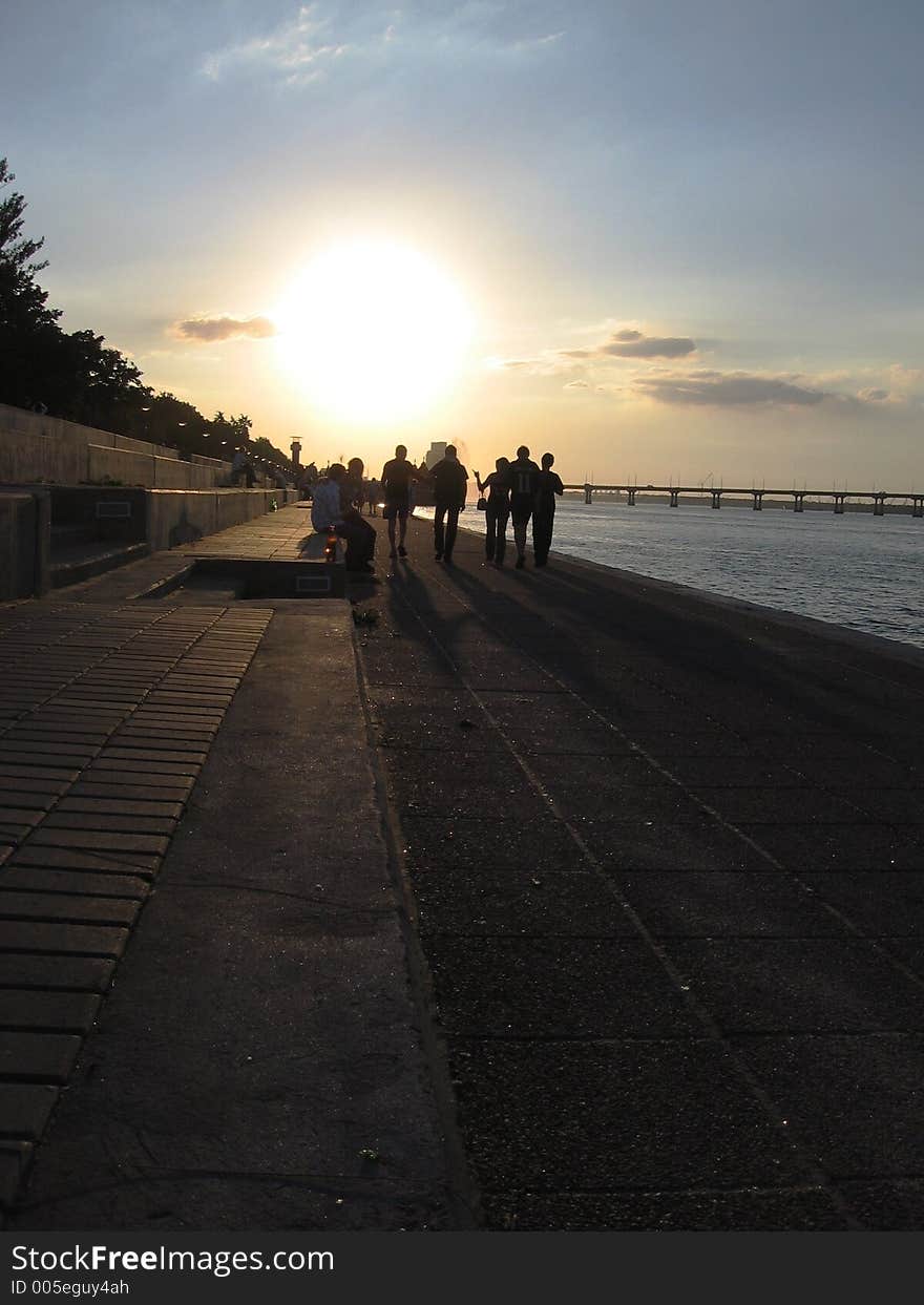 People on the Dniepr bay in evening. People on the Dniepr bay in evening