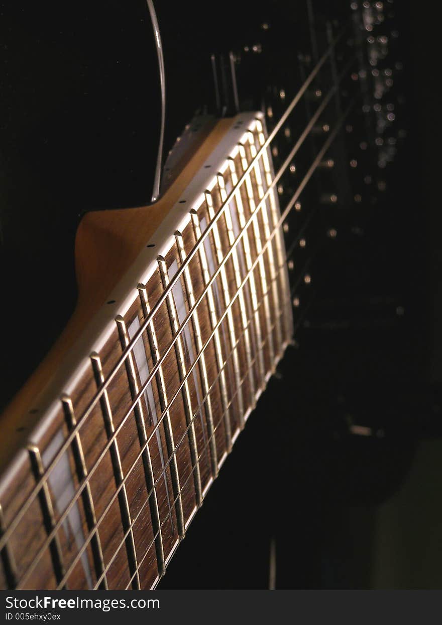 Guitar strings and neck close up. Guitar strings and neck close up